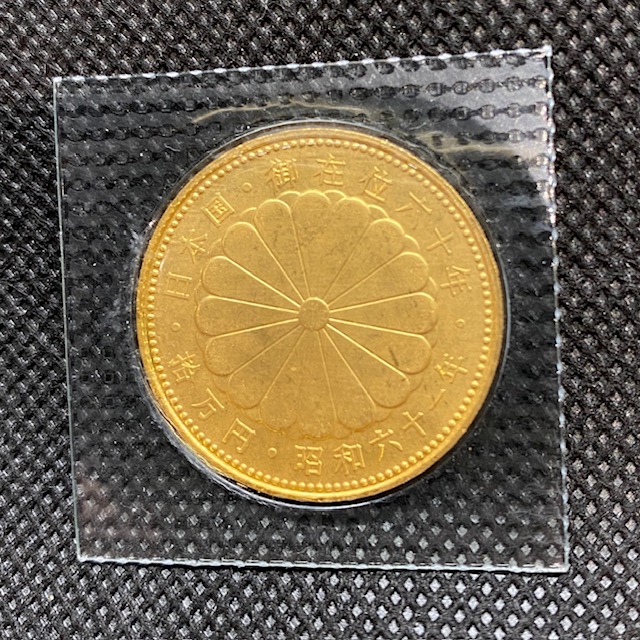 天皇陛下御在位六十年記念10万円金貨